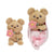 SWADDLE BABIES - 8.5IN BEAR HOLDING FLOWER IN SLING